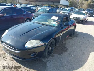 2007 Jaguar XK with VIN SAJDA44B975B01444, listed as a IAAI auction lot 41606094 with 155,227 mi miles. Bid and sale history available at carsss.com. Image 17.