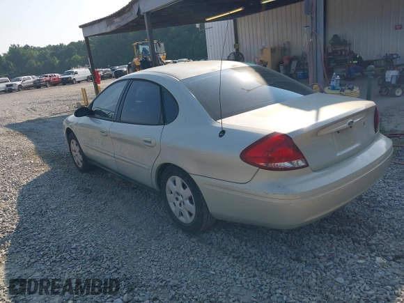 2005 Ford Taurus SE with VIN 1FAFP53205A131307, listed as a IAAI auction lot 42678385 with 198,491 mi miles and . Bid and sale history available at DreamBid. Image 3.