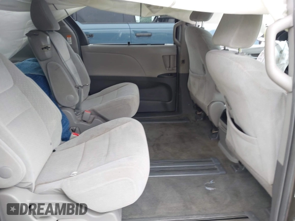 2015 Toyota Sienna LE AAS with VIN 5TDKK3DC5FS606862, listed as a IAAI auction lot 42464119 with 158,135 mi miles and . Bid and sale history available at DreamBid. Image 8.
