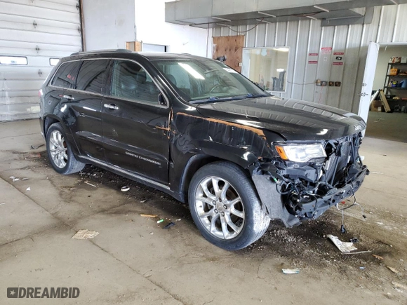 2014 Jeep Grand Cherokee Summit with VIN 1C4RJFJG0EC337678, listed as a Copart auction lot 54081735 with 107,704 mi miles and Clean Title. Bid and sale history available at carsss.com. Image 4.