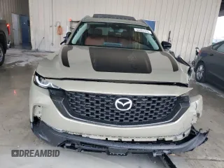 2024 Mazda CX-50 2.5 Turbo with VIN 7MMVABXY5RN230045, listed as a Copart auction lot 50488955 with 7,245 mi miles and Salvage Title. Bid and sale history available at carsss.com. Image 5.