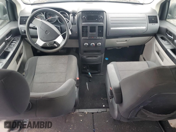 2009 Dodge Grand Caravan SE with VIN 2D8HN44E59R686851, listed as a Copart auction lot 48758335 with Not provided miles and Salvage title. Bid and sale history available at DreamBid. Image 8.