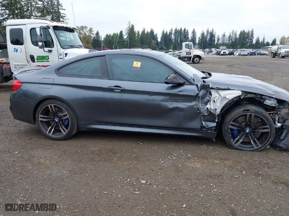 2015 BMW M4 with VIN WBS3R9C55FK333704, listed as a IAAI auction lot 40552025 with 1 mi miles. Bid and sale history available at carsss.com. Image 13.