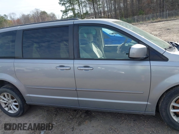 2014 Dodge Grand Caravan SXT with VIN 2C4RDGCG4ER106106, listed as a IAAI auction lot 41830512 with 135,044 mi miles and . Bid and sale history available at DreamBid. Image 13.