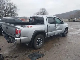 2022 Toyota Tacoma 4WD SR with VIN 3TMCZ5AN9NM504870, listed as a IAAI auction lot 41635029 with 28,361 mi miles. Bid and sale history available at carsss.com. Image 4.