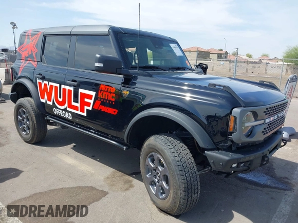 2024 Ford Bronco Badlands z VIN 1FMEE9BP7RLA35583, wystawiony jako IAAI lot #41905835 z przebiegiem 11 260 mil mil oraz . Historia ofert i sprzedaży dostępna na DreamBid. Obrazek 1.