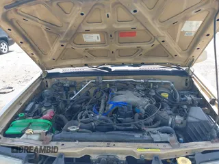1999 Nissan Frontier XE with VIN 1N6ED26Y2XC321255, listed as a IAAI auction lot 42580192 with 147,006 mi miles and . Bid and sale history available at DreamBid. Image 10.