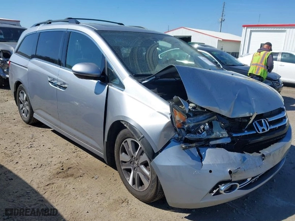 2016 Honda Odyssey Touring Elite with VIN 5FNRL5H91GB158499, listed as a IAAI auction lot 41899037 with 119,364 mi miles. Bid and sale history available at carsss.com. Image 1.