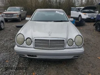 1999 Mercedes-Benz E-Class with VIN WDBJF65H5XA906877, listed as a Copart auction lot 76156014 with 141,956 mi miles and Clean Title. Bid and sale history available at carsss.com. Image 5.