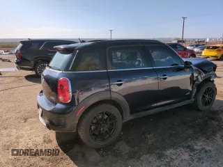 2012 MINI Countryman S with VIN WMWZC5C50CWL63321, listed as a Copart auction lot 52427065 with 126,898 mi miles and Salvage Title. Bid and sale history available at DreamBid. Image 3.