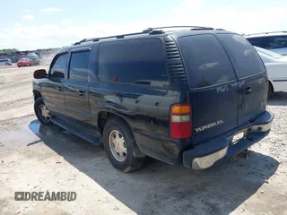 2002 GMC Yukon XL SLT with VIN 1GKEC16Z02J291268, listed as a IAAI auction lot 41973593 with 317,930 mi miles. Bid and sale history available at carsss.com. Image 3.