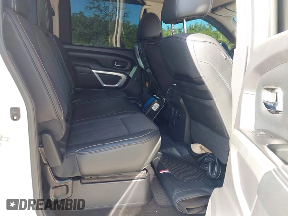 2016 Nissan Titan Platinum Reserve with VIN 1N6BA1F4XGN517905, listed as a IAAI auction lot 42676671 with 110,004 mi miles and . Bid and sale history available at DreamBid. Image 8.