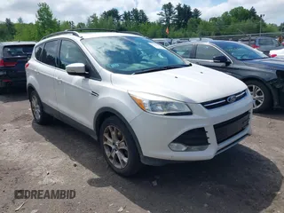 2013 Ford Escape SEL z VIN 1FMCU9HX1DUA51248, wystawiony jako IAAI lot #42185187 z przebiegiem 123 845 mil mil oraz . Historia ofert i sprzedaży dostępna na DreamBid. Obrazek 1.