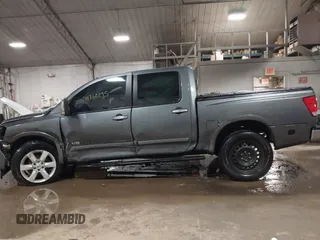 2014 Nissan Titan S with VIN 1N6AA0EC6EN513801, listed as a IAAI auction lot 41762295 with 128,412 mi miles and . Bid and sale history available at DreamBid. Image 14.