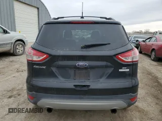 2013 Ford Escape SE with VIN 1FMCU0GXXDUB76102, listed as a Copart auction lot 44226025 with 104,127 mi miles and Salvage Title. Bid and sale history available at DreamBid. Image 6.