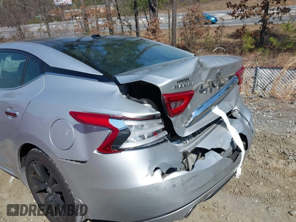 2018 Nissan Maxima SL with VIN 1N4AA6AP4JC395080, listed as a IAAI auction lot 41781646 with 63,693 mi miles and . Bid and sale history available at DreamBid. Image 6.