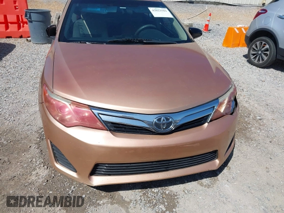 2012 Toyota Camry L with VIN 4T1BF1FKXCU030959, listed as a IAAI auction lot 42022501 with 304,524 mi miles. Bid and sale history available at carsss.com. Image 12.
