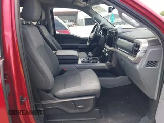 2023 Ford F-150 Lightning Pro with VIN 1FTVW1EL8PWG33656, listed as a IAAI auction lot 42260659 with 22,490 mi miles and . Bid and sale history available at DreamBid. Image 5.