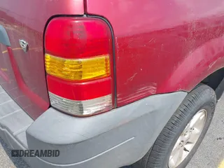 2006 Ford Escape XLT with VIN 1FMYU03136KD09448, listed as a IAAI auction lot 42578120 with 235,521 mi miles and . Bid and sale history available at DreamBid. Image 12.