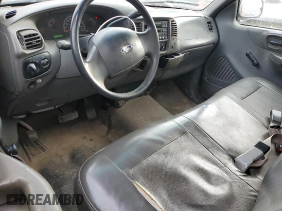 2001 Ford F-150 XL z VIN 3FTZF17291MA72686, wystawiony jako Copart lot #83103904 z przebiegiem 126 018 mil mil oraz Szkoda całkowita • Salvage title. Historia ofert i sprzedaży dostępna na DreamBid. Obrazek 8.