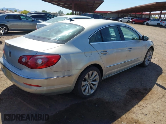2011 Volkswagen CC Sport with VIN WVWMP7AN0BE723840, listed as a IAAI auction lot 42141612 with 155,616 mi miles. Bid and sale history available at carsss.com. Image 4.