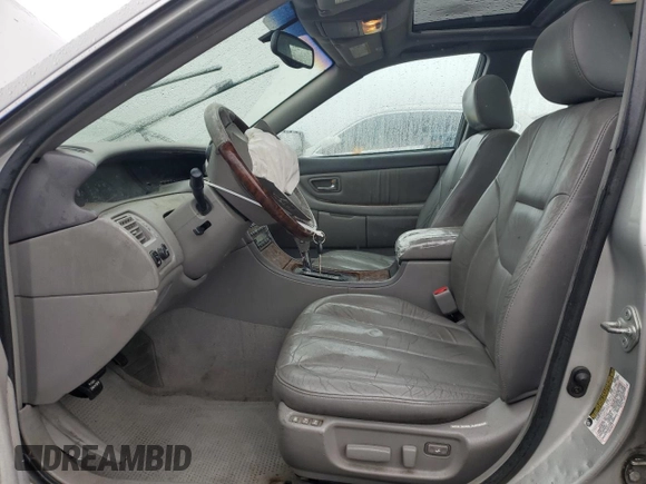 2004 Toyota Avalon XL z VIN 4T1BF28B94U380488, wystawiony jako Copart lot #57809445 z przebiegiem 103 078 mil mil oraz Szkoda całkowita • Salvage title. Historia ofert i sprzedaży dostępna na DreamBid. Obrazek 7.
