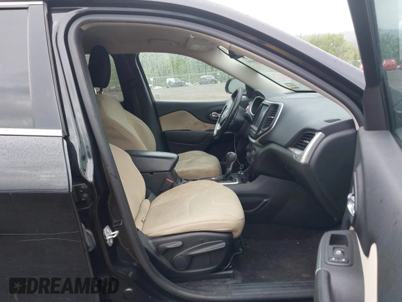 2016 Jeep Cherokee Latitude with VIN 1C4PJMCS6GW221075, listed as a IAAI auction lot 42259107 with 115,912 mi miles and . Bid and sale history available at DreamBid. Image 5.