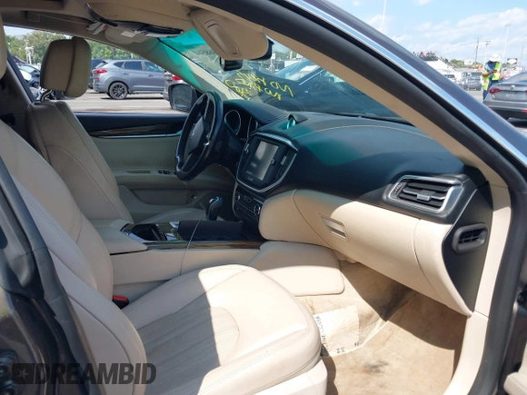 2015 Maserati Ghibli S Q4 with VIN ZAM57RTA7F1154097, listed as a IAAI auction lot 42568564 with 113,436 mi miles and . Bid and sale history available at DreamBid. Image 5.