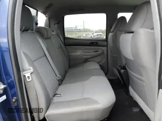 2014 Toyota Tacoma with VIN 5TFLU4EN7EX106909, listed as a Copart auction lot 46906235 with 102,681 mi miles and Salvage Title. Bid and sale history available at DreamBid. Image 10.