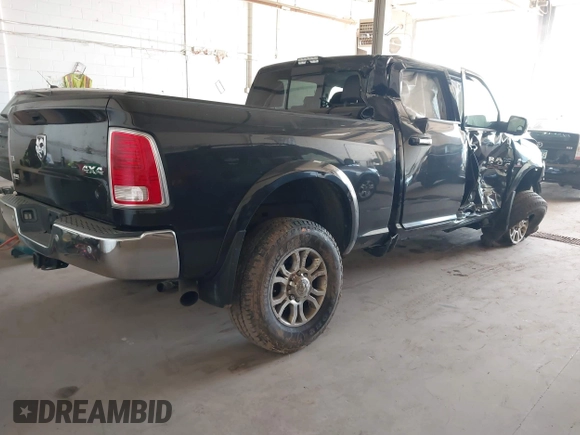 2017 Ram 2500 Laramie with VIN 3C6UR5FL8HG671078, listed as a IAAI auction lot 42233014 with 295,572 mi miles and . Bid and sale history available at DreamBid. Image 4.