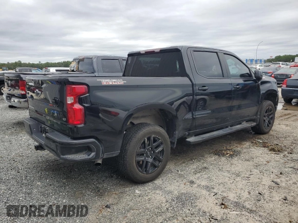 2023 Chevrolet Silverado 1500 LT Trail Boss with VIN 3GCPDFEK7PG106497, listed as a Copart auction lot 75603264 with 28,970 mi miles and Salvage Title. Bid and sale history available at DreamBid. Image 3.