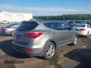 2013 Hyundai Santa Fe Sport z VIN 5XYZU3LA1DG112226, wystawiony jako IAAI lot #42241119 z przebiegiem 187 788 mil mil oraz . Historia ofert i sprzedaży dostępna na DreamBid. Obrazek 4.