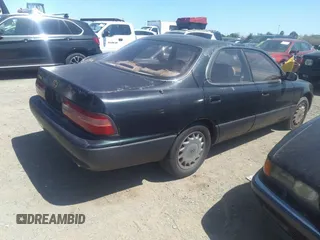 1995 Lexus ES 300 with VIN JT8GK13T2S0115625, listed as a IAAI auction lot 38286680 with 194,450 mi miles and . Bid and sale history available at DreamBid. Image 4.