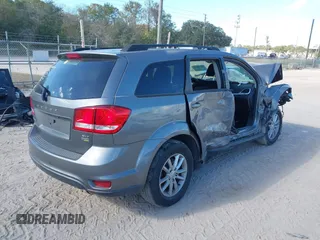 2013 Dodge Journey SXT with VIN 3C4PDCBG6DT552707, listed as a IAAI auction lot 40978636 with Not Provided miles. Bid and sale history available at carsss.com. Image 4.
