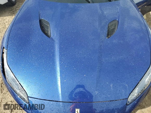 2019 Ferrari Portofino z VIN ZFF89FPAXK0242549, wystawiony jako Copart lot #74454234 z przebiegiem Nie podano mil oraz Nie do naprawy. Historia ofert i sprzedaży dostępna na DreamBid. Obrazek 11.