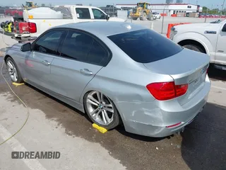 2014 BMW 3 Series 328i xDrive with VIN WBA3B5C51EP543588, listed as a IAAI auction lot 42105211 with 117,717 mi miles and . Bid and sale history available at DreamBid. Image 3.