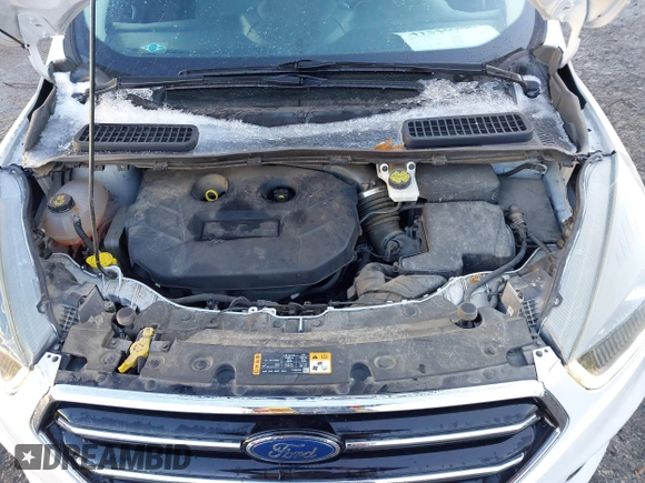 2017 Ford Escape Titanium with VIN 1FMCU9J93HUE96611, listed as a IAAI auction lot 41546906 with 90,586 mi miles. Bid and sale history available at carsss.com. Image 10.