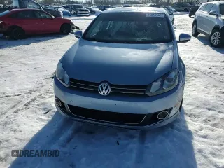 2012 Volkswagen Golf TDI z VIN WVWNM7AJXCW215994, wystawiony jako Copart lot #62693075 z przebiegiem 122 234 mil mil oraz Nie do naprawy • Non repairable. Historia ofert i sprzedaży dostępna na DreamBid. Obrazek 11.