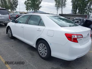2014 Toyota Camry L with VIN 4T1BF1FK4EU403013, listed as a IAAI auction lot 42115089 with 221,686 mi miles and . Bid and sale history available at DreamBid. Image 3.