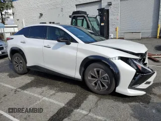 2023 Lexus RZ with VIN JTJAAAAB9PA017825, listed as a Copart auction lot 44162155 with 23,925 mi miles and Salvage Title. Bid and sale history available at carsss.com. Image 4.