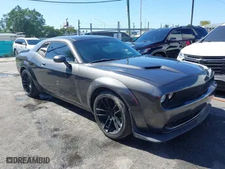 2019 Dodge Challenger SXT with VIN 2C3CDZAG2KH735616, listed as a IAAI auction lot 41836380 with 109,949 mi miles. Bid and sale history available at carsss.com. Image 1.