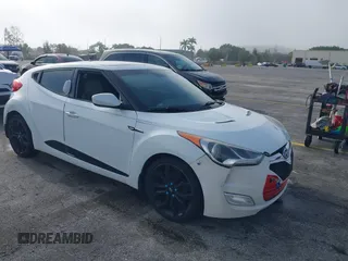 2013 Hyundai Veloster w/Black Int with VIN KMHTC6ADXDU161541, listed as a IAAI auction lot 41937033 with 109,702 mi miles and . Bid and sale history available at DreamBid. Image 1.