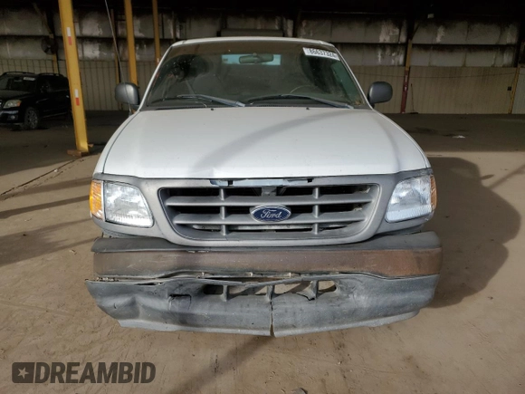 2001 Ford F-150 XL with VIN 2FTPF17Z41CA93204, listed as a Copart auction lot 86637324 with 121,331 mi miles and Salvage title. Bid and sale history available at DreamBid. Image 5.