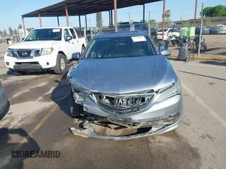 2016 Acura TLX with VIN 19UUB1F38GA002104, listed as a IAAI auction lot 41998966 with 124,159 mi miles. Bid and sale history available at carsss.com. Image 12.