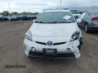 2012 Toyota Prius z VIN JTDKN3DP8C3016162, wystawiony jako IAAI lot #42256101 z przebiegiem 182 308 mil mil oraz . Historia ofert i sprzedaży dostępna na DreamBid. Obrazek 11.