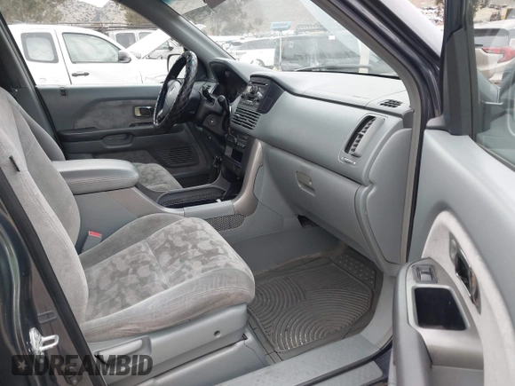 2004 Honda Pilot EX with VIN 2HKYF18494H619509, listed as a IAAI auction lot 42056926 with 185,600 mi miles and . Bid and sale history available at DreamBid. Image 5.