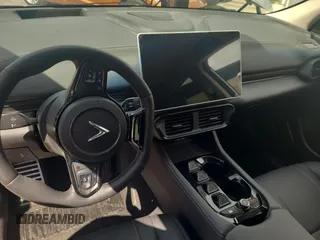 2023 VinFast VF 8 Eco с VIN RLLV1AEB5PH002749, выставлен на аукционе Copart как лот 61365875 с пробегом 5 916 миль миль и Списание • Salvage title. История ставок и продаж доступна на DreamBid. Изображение 9.