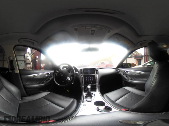 2015 Infiniti Q50 Premium z VIN JN1BV7ARXFM411040, wystawiony jako IAAI lot #41706295 z przebiegiem 97 297 mil mil oraz . Historia ofert i sprzedaży dostępna na DreamBid. Obrazek 18.