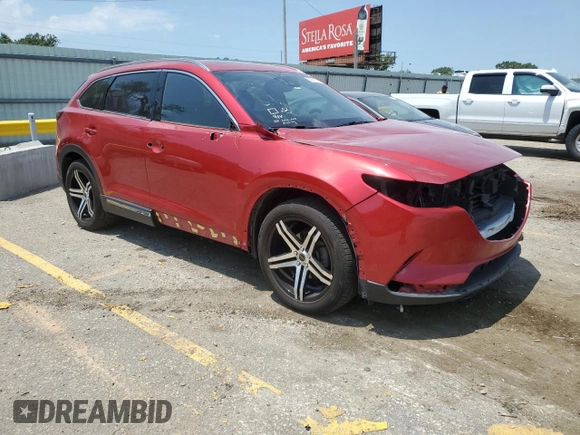 2016 Mazda CX-9 Grand Touring with VIN JM3TCADY6G0105783, listed as a Copart auction lot 63975195 with 135,972 mi miles and Salvage title. Bid and sale history available at DreamBid. Image 4.