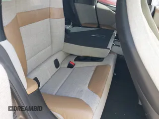2015 BMW i3 z VIN WBY1Z2C51FV286397, wystawiony jako IAAI lot #41729019 z przebiegiem Nie podano mil oraz . Historia ofert i sprzedaży dostępna na DreamBid. Obrazek 8.